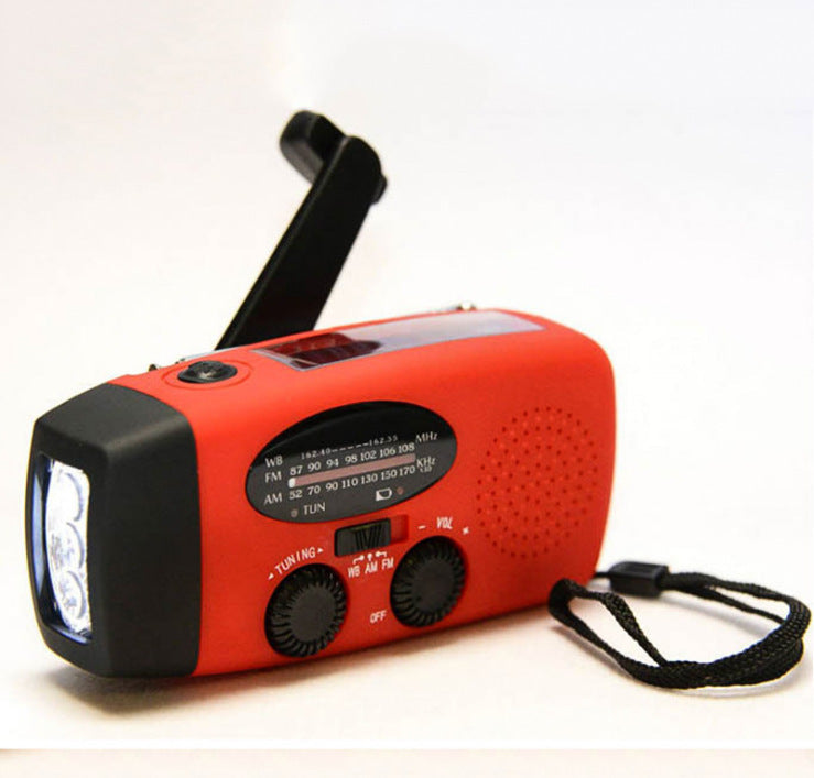 Solar hand crank USB charging radio flashlight capnig