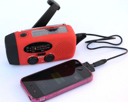 Solar hand crank USB charging radio flashlight capnig