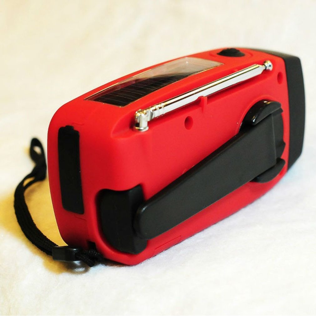 Solar hand crank USB charging radio flashlight capnig